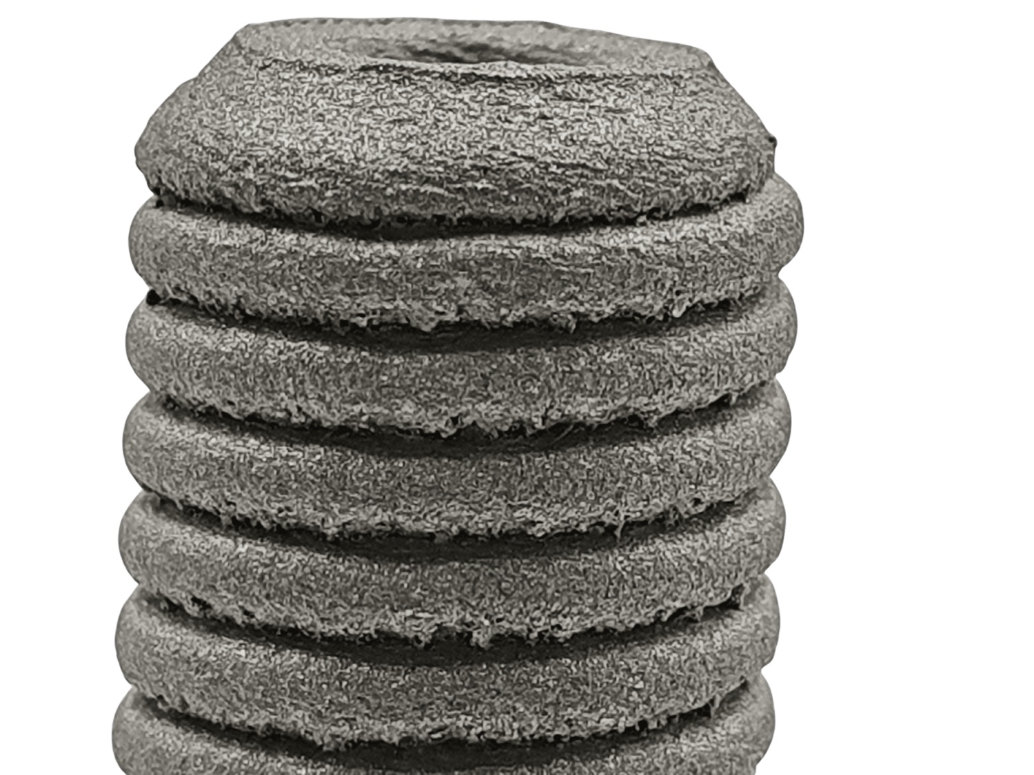 Macro close-up of a rough, granular as-printed thread surface